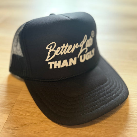 “better late than ugly” trucker hat